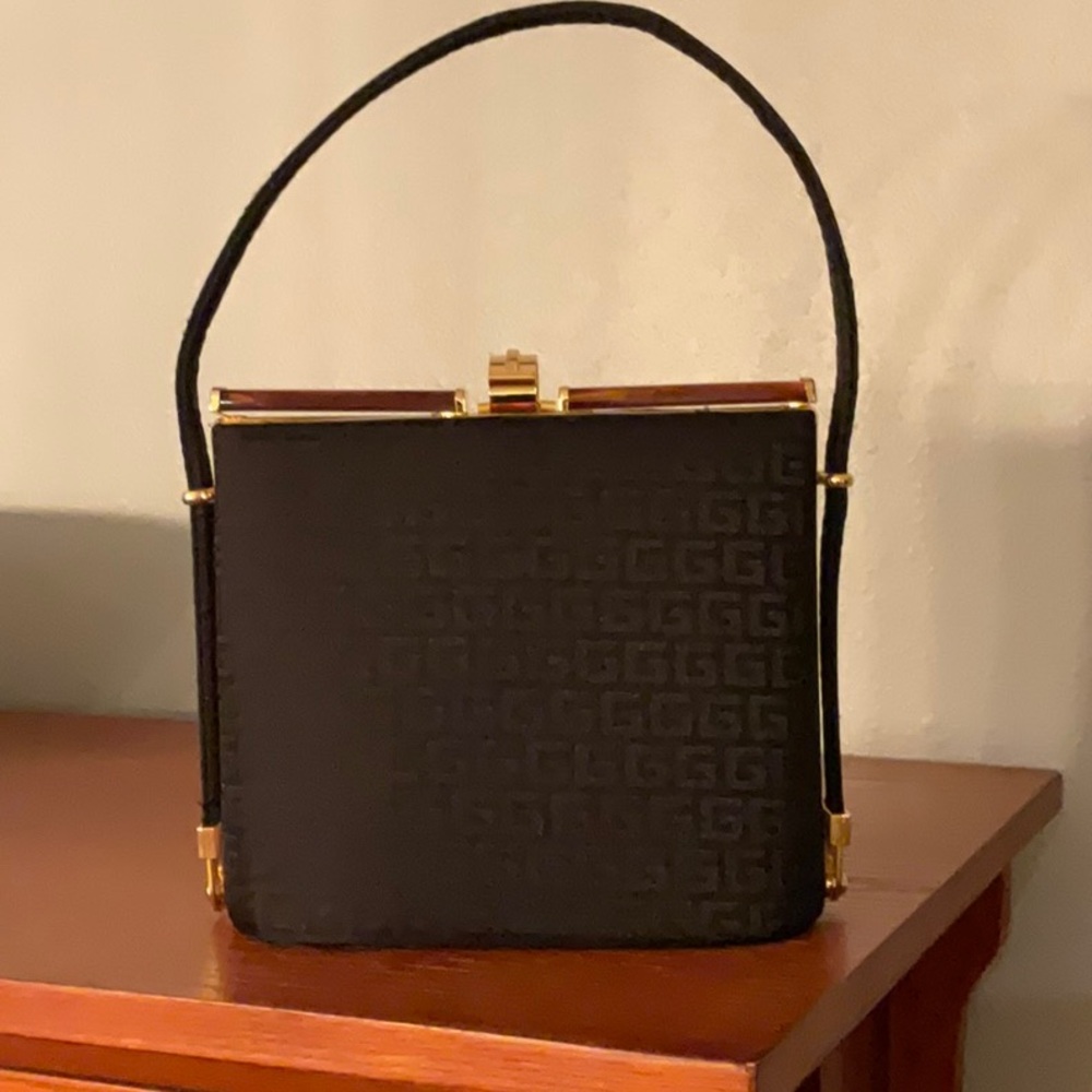 Gorgeous evening bag. Black trimmed and gold and tortoise shell